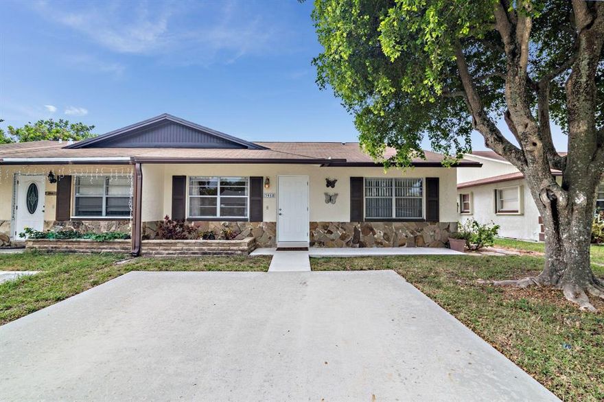 ALL SIZES APPROX,  THIS WELL MAINTAINED HALF A DUPLEX IS AN EASY KEEPER! NO HOA, LOW TAXES, NO RESTRICTIONS ON RENTALS. THIS UNIT IS MOVE IN READY, FRESH PAINT AND NEW CARPET! THE EAT IN KITCHEN IS SPACIOUS WITH A GOOD AMOUNT OF CABINETS. LARGE LIVING AREA WITH LAMINATE WOOD FLOOR, FLORIDA ROOM IS SUNNY AND BRIGHT WITH BRAND NEW CARPET! MASTER BEDROOM HAS WALK IN CLOSET WITH BUILT IN CABINETRY AND A LAMINATE WOOD FLOOR. SECOND BEDROOM HAS BRAND NEW CARPET. INSIDE UTILITY ROOM.  LARGE FENCED BACK YARD, BUILT IN SHED. GREAT LOCATION, CLOSE TO I-95, PALM BEACH INTERNATIONAL AIRPORT AND THE BEST BEACHES!! PROPERTY IS AN ESTATE SALE, TRUSTEE HAS NEVER RESIDED IN PROPERTY. WONT LAST! DON'T MISS THIS MOVE IN READY PROPERTY!