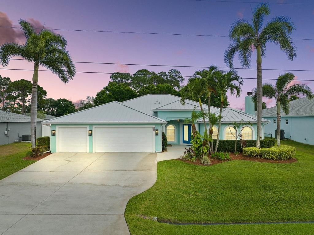 Photo of 332 SW Enon Street, Port Saint Lucie, FL 34953 (MLS # R10977972)