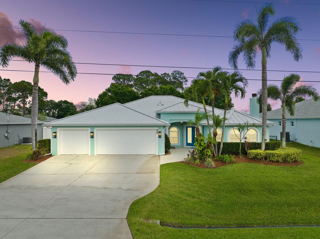 Photo of 332 SW Enon Street, Port Saint Lucie, FL 34953 (MLS # R10977972)