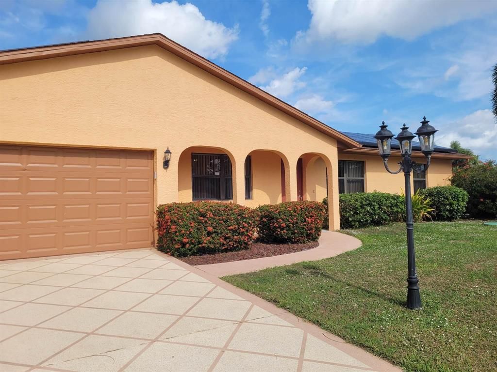 Photo of 457 SE Walters Terrace, Port St Lucie, FL 34983 (MLS # R10860360)