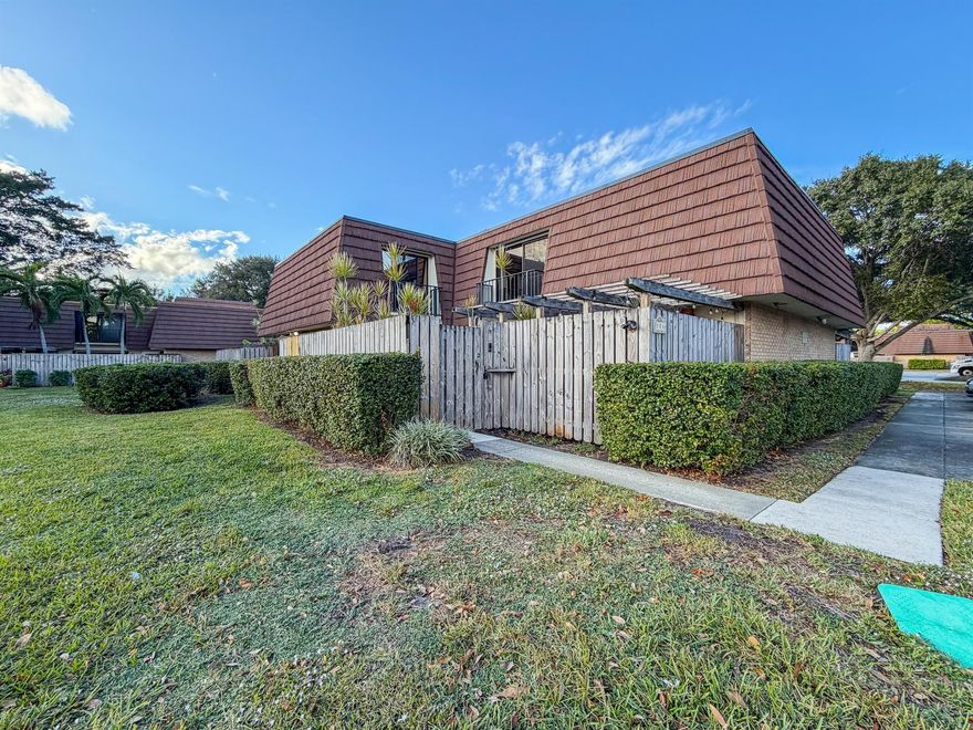 Best location in the community! Private and lake front! Spacious and bright 2BR/2.5BA townhouse located in the desirable Garden Lakes community in Palm Beach Gardens. This well-maintained two-story home offers an open living and dining layout with excellent natural light and an oversized private fenced patio--perfect for outdoor entertaining, gardening, or relaxing.The main level features a Den/ Office, a half bath, full-size laundry, and a functional kitchen with ample cabinetry and counter space. Upstairs are two large bedrooms, each with its own balcony and generous closet space. The primary suite includes an en-suite bath, while an additional full bath serves the guest bedroom.