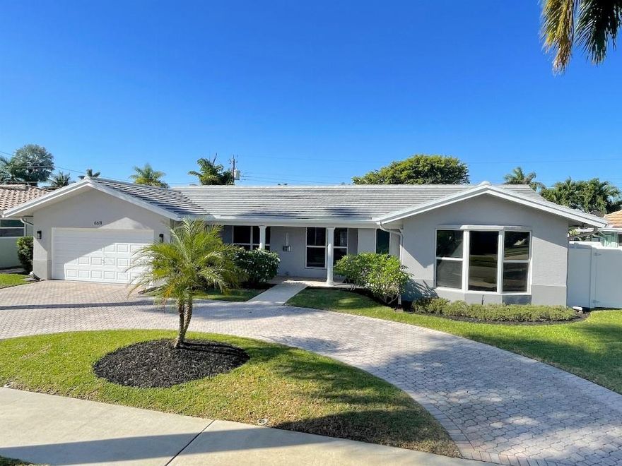 Stunning updated home with 3 bedrooms and 3 bathrooms. As you step through the front door this home embraces you with attention to detail. Home has been updated with new indoor/outdoor LED lights/bulbs, new ceiling fans, updated bathrooms and more. Roof has been replaced a year ago and has still 9 years warranty. Attic with storage space is accessible from the garage. Garage has been updated with a Smart Garage Door Opener, epoxy floor, led lights and a ceiling rack for additional storage. All windows are secure hurricane impact rated as well as the garage door that has reinforcement strut braces. Backyard Jacuzzi is near outdoor shower and door to 3rd bathroom. AC has 2 zones to control living and sleeping area with different temperatures. Easy access to Hospitals and Schools.