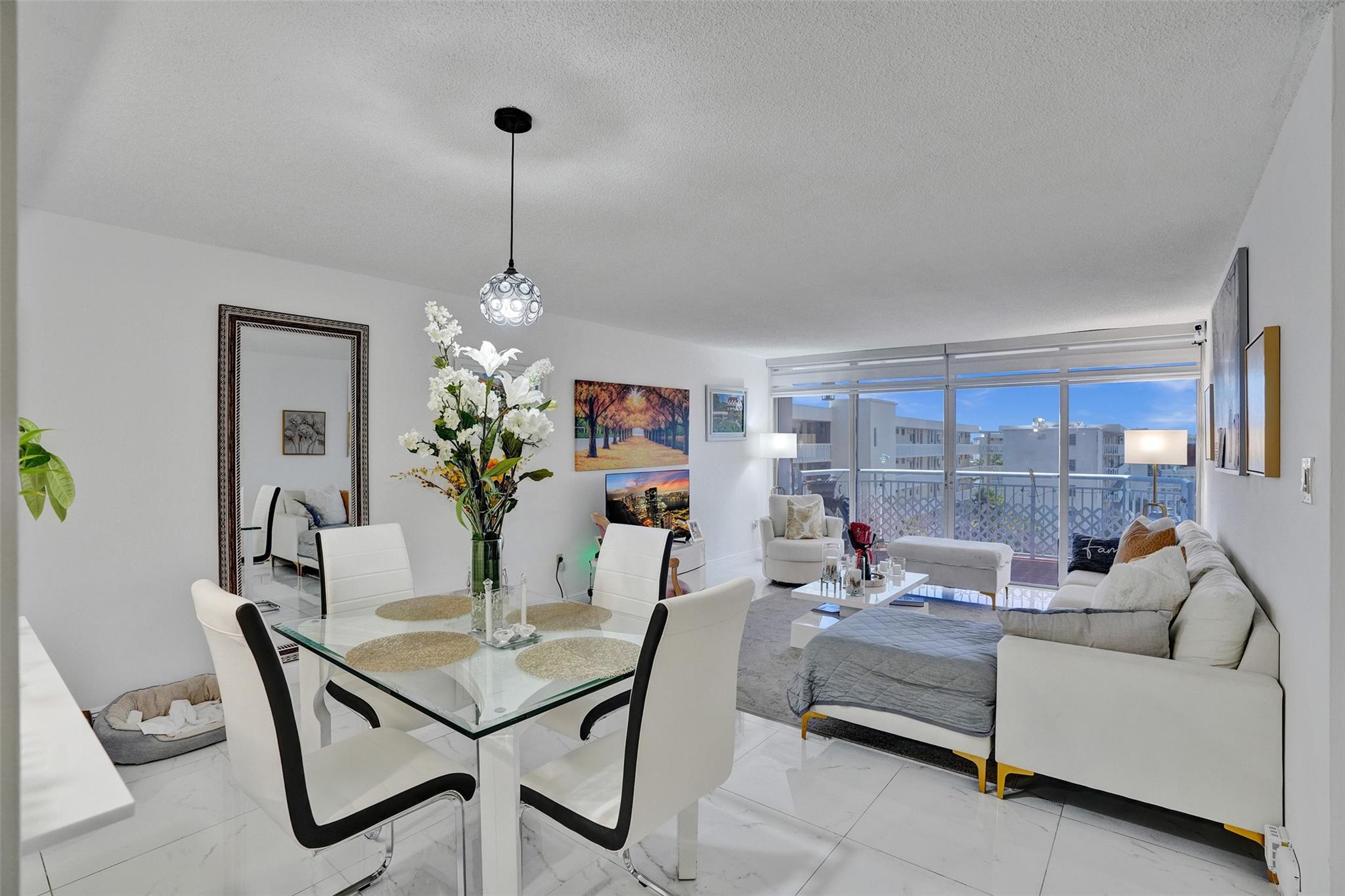 Step into sunshine and style in this beautifully remodeled 1-bedroom, 1-bath condo in the heart of Aventura! This bright and modern unit offers an open layout, a sleek updated kitchen and bathroom, and added convenience of your own in-unit washer and dryer. Available unfurnished or fully furnished for $2,400/month—just pack your bags and move right in! Live the resort lifestyle with great building amenities and an unbeatable location close to shopping, dining, and the sparkling beaches. Your perfect South Florida rental awaits!