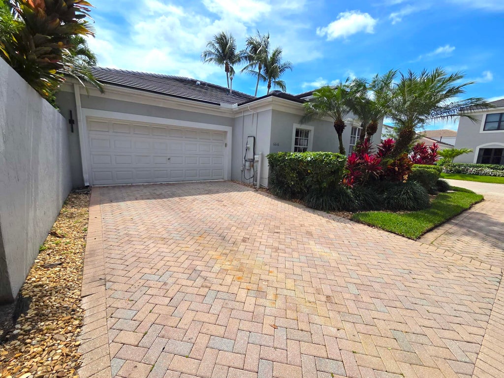 Photo of 6616 NW 43rd Terrace, Boca Raton, FL 33496 (MLS # R11090695)