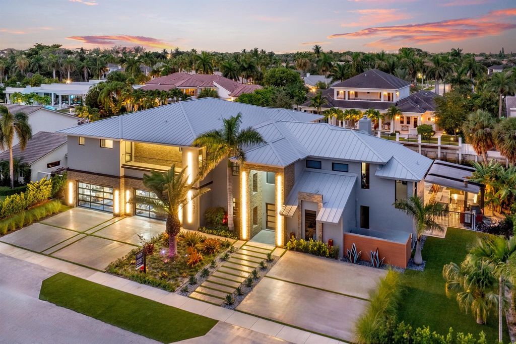 Photo of 839 NE Bay Isle Drive, Boca Raton, FL 33487 (MLS # R11121566)