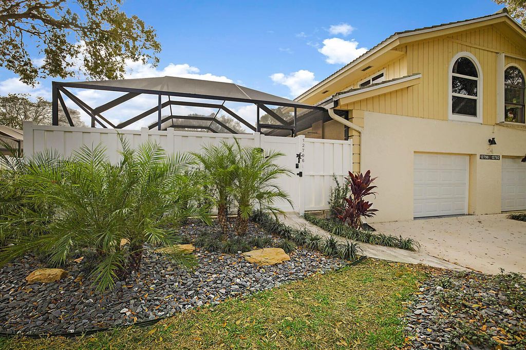 Photo of 12796 Woodmill Drive, Palm Beach Gardens, FL 33418 (MLS # R11051617)