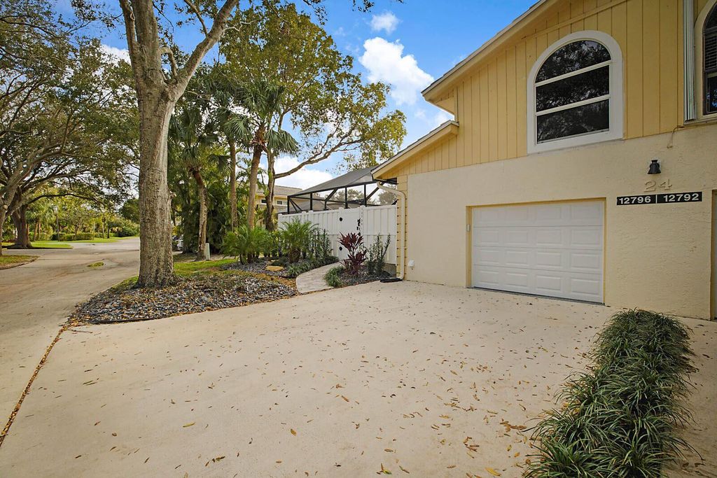 Photo of 12796 Woodmill Drive, Palm Beach Gardens, FL 33418 (MLS # R11051617)