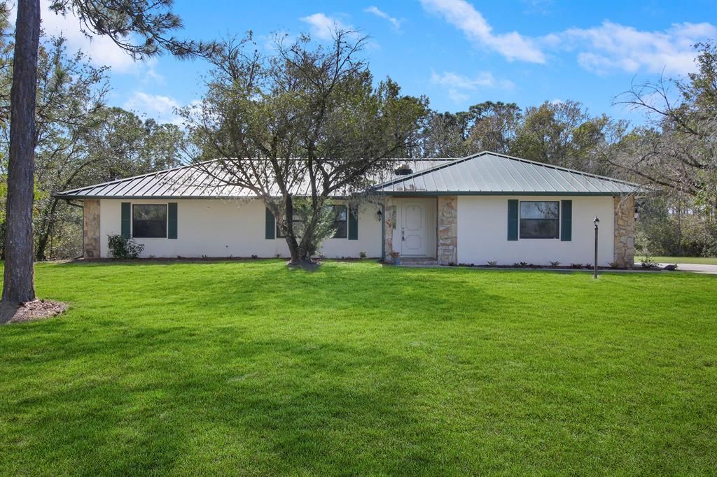 Photo of 7835 Saddlebrook Drive, Port St Lucie, FL 34986 (MLS # R10861080)