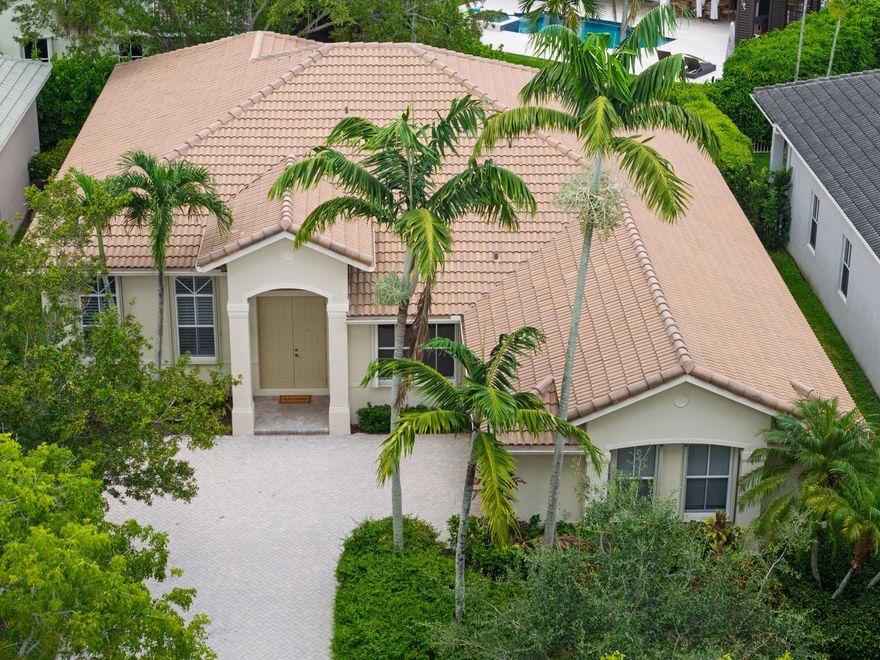 Impeccable 4BR/2.5BA home in gated Savannah, Weston, fully remodeled inside and out. Vacant and move-in ready, it boasts a 2024 Trane 5-ton variable-speed A/C with Nest thermostat. Open layout with soaring ceilings, abundant light, and elegant finishes. Gourmet kitchen features granite counters, stainless appliances, breakfast nook, and custom cabinetry. Spacious primary suite offers dual walk-ins, soaking tub, walk-in shower, and double vanities. Includes hurricane shutters, 2-car garage, full laundry room, and lush landscaping. Zoned for top-rated schools and near parks, golf, Weston Town Center, and major highways. Property taxes exclude homestead exemption.