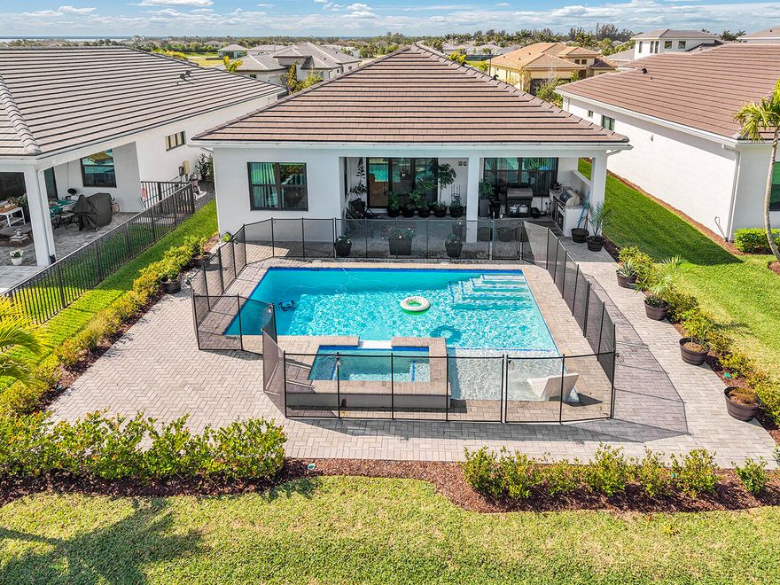 Beautifully maintained 2 bedroom, 2 bathroom home with a versatile den, perfectly situated on a serene lake lot in the highly sought after active adult community of Cresswind Palm Beach. This home is designed for comfort and entertaining, featuring a heated saltwater pool, spacious outdoor kitchen, and tranquil lake views. Enjoy Florida living year round with seamless indoor-outdoor flow and a thoughtfully designed layout. Cresswind offers resort style amenities and an active lifestyle just minutes from everything Palm Beach has to offer.