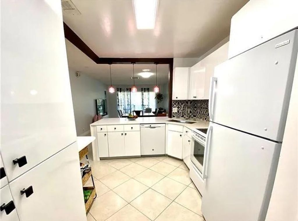Photo of 11613 NW 28th Street #2, Coral Springs, FL 33065 (MLS # F10551051)