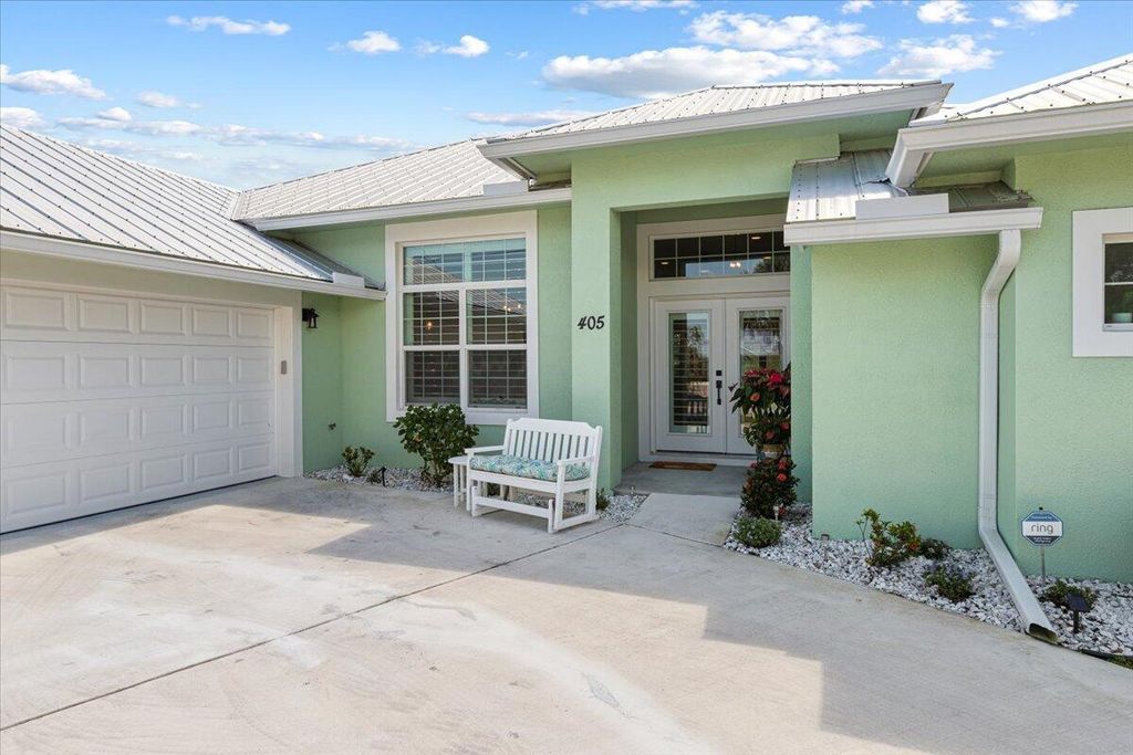 Photo of 405 SW Kestor Drive, Port Saint Lucie, FL 34953 (MLS # R10972645)