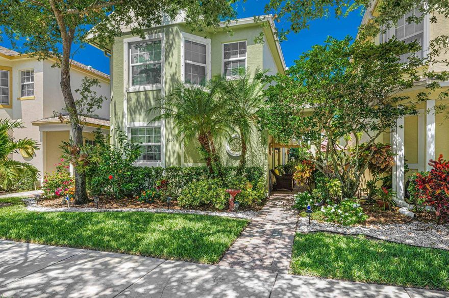 Your East Lake Village Oasis Awaits! Meticulously Upgraded 3 Bed, 2.5 Bath home. This stunning property offers the perfect blend of comfort, style and convenience, with TWO MAIN SUITES for ultimate flexibility. Enjoy peace of mind with impact windows, a NEWER A/C (3 years), and NEWER HOT WATER HEATER (5 years). The interior shines with BRAND-NEW RANGE, WASHER, DRYER, and elegant luxury vinyl plank FLOORING, creating a warm and welcoming atmosphere. Unwind on your spacious private patio, perfect for Florida living. Enjoy community amenities including a heated pool, playground and scenic walking trails. Located just minutes from beaches, shopping and dining options. Easy access to US-1 and major highways.