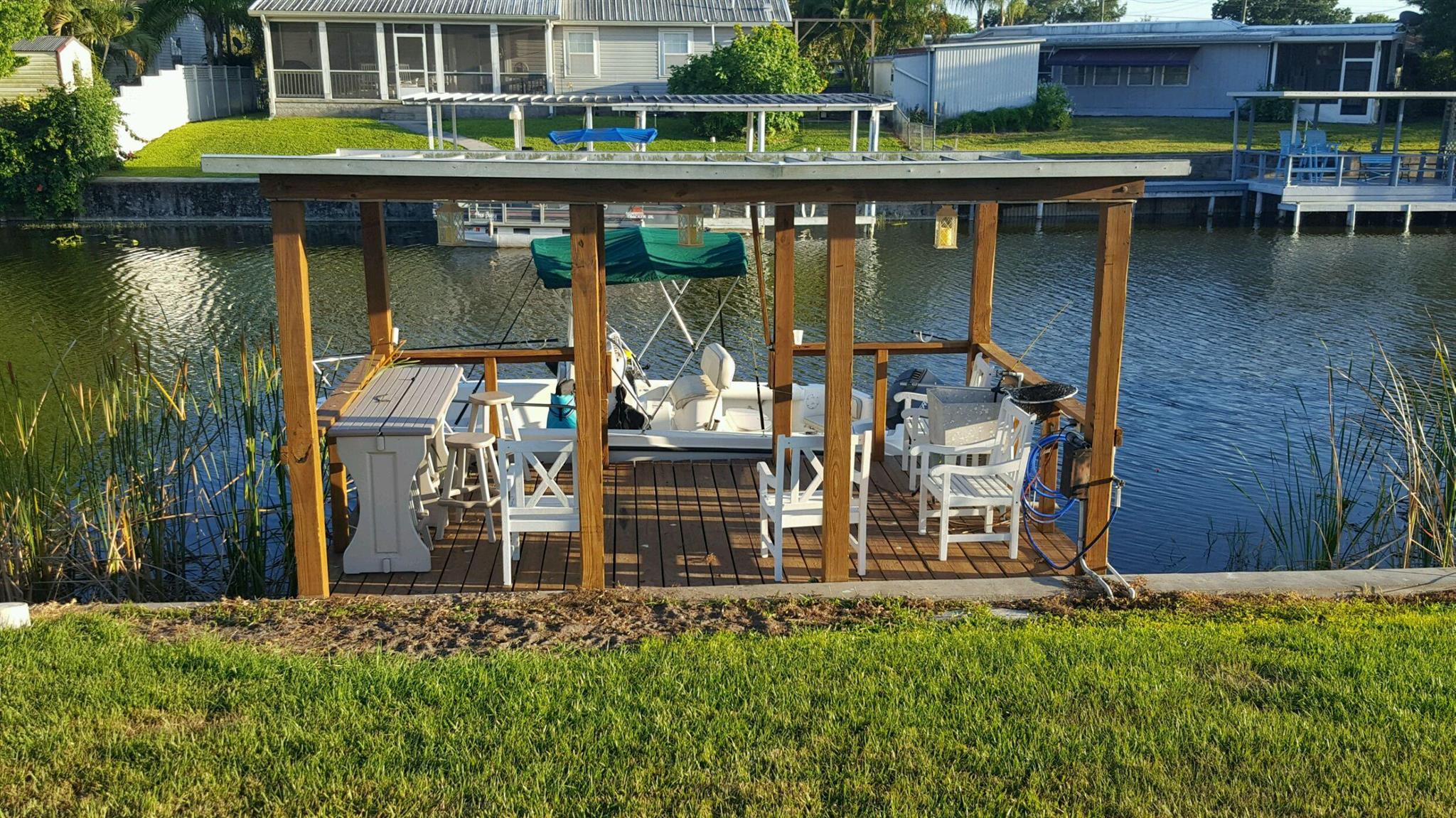 Welcome to the Lake House! Waterfront delight with a dock with electric and running water! Escape the cold and snow to this cottage style getaway furnished beautifully. Very quiet and peaceful with newer appliances including full size washer and dryer, gas grill, fire pit and large enclosed porch with AC. This is only available for a seasonal rental.