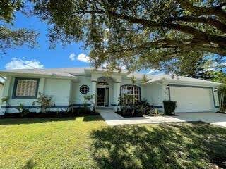 Photo of 2826 SW Ann Arbor Road, Port Saint Lucie, FL 34953 (MLS # R10748832)
