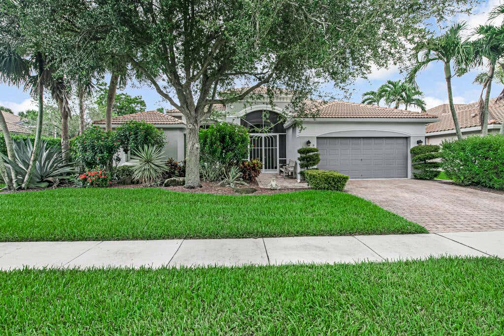 Photo of 9611 RAVELLO Street, Lake Worth, FL 33467 (MLS # B26062093)