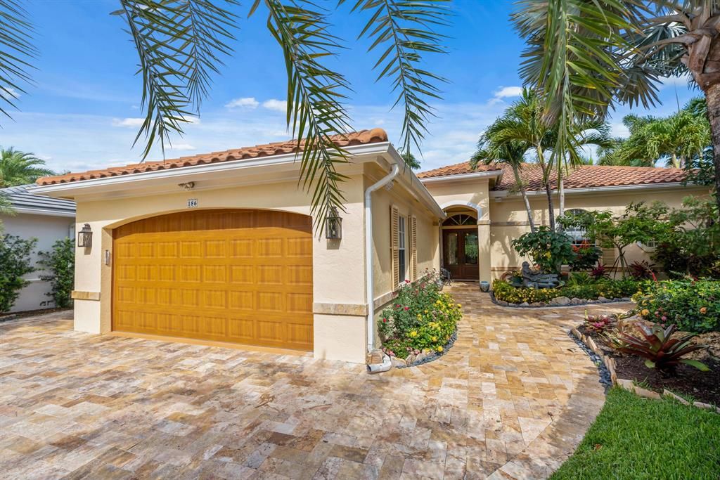 Photo of 186 Golf Village Boulevard, Jupiter, FL 33458 (MLS # R10717965)