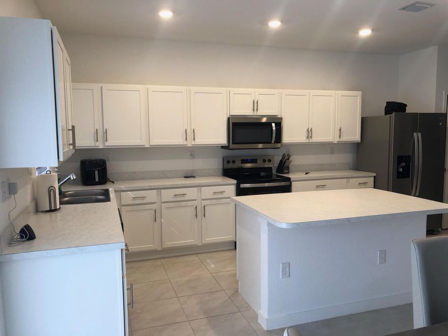 AMAZING 3 BEDROOM 2.5 BATHROOM TOWNHOUSE WITH A 1 CAR GARAGE,BUILT IN 2025,LARGE MASTER SUITE WITH A MODERN BATHROOM,THE 2 OTHER BEDROOMS SHARE A COMMON BATHROOM,1/2 BATHROOM IS ON THE GROUND FLOOR,LOTS OF SPACE FOR FAMILY LIVING AND GUESTS,LOCATED IN HIGHLAND OAKS WHICH WAS BUILT IN 2025,BRIGHT OPEN FLOOR PLAN WITH HIGH QUALITY FINISHES,BACKYARD PERFECT FOR OUTDOOR ENTERTAINING, LARGE SPACIOUS DRIVEWAY,GUEST PARKING IS AVAILABLE,KITCHEN HAS ALL STAINLESS STEEL APPLIANCES,SMART HOME LOCK SYSTEM,DESIREABLE NEIGHBORHOOD,FAMILY FRIENDLY AREA,PRIME LOCATION,CLOSE TO THE BEACH,1-95 AND GOLF COURSES,VERY CL0SE TO PUBLIX,HIGHWAYS AND NEAR BY RESTAURANTS,TRUELY A MUST SEE,