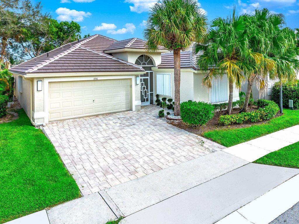 Photo of 7751 Edinburough Lane, Delray Beach, FL 33446 (MLS # R10925321)