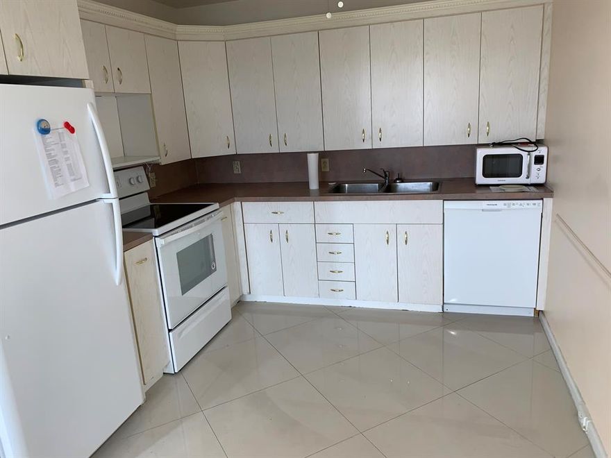 LOWEST PRICED 2 bedroom 2 bath penthouse unit. 24''porcelain tile on diagonal throughout. Remodeled kitchen with updated appliances. Remodeled ceiling with fan. Smooth ceilings throughout, no popcorn. Enclosed patio,with 2 sliders to patio. Beautiful crown molding in living room.  Oversize linen closet, Cable and internet included in maintenance Steps to bus,pool, parking.  JUST REDUCED  $$$$$$$$$$$$$$$$$ BRING ALL OFFERS