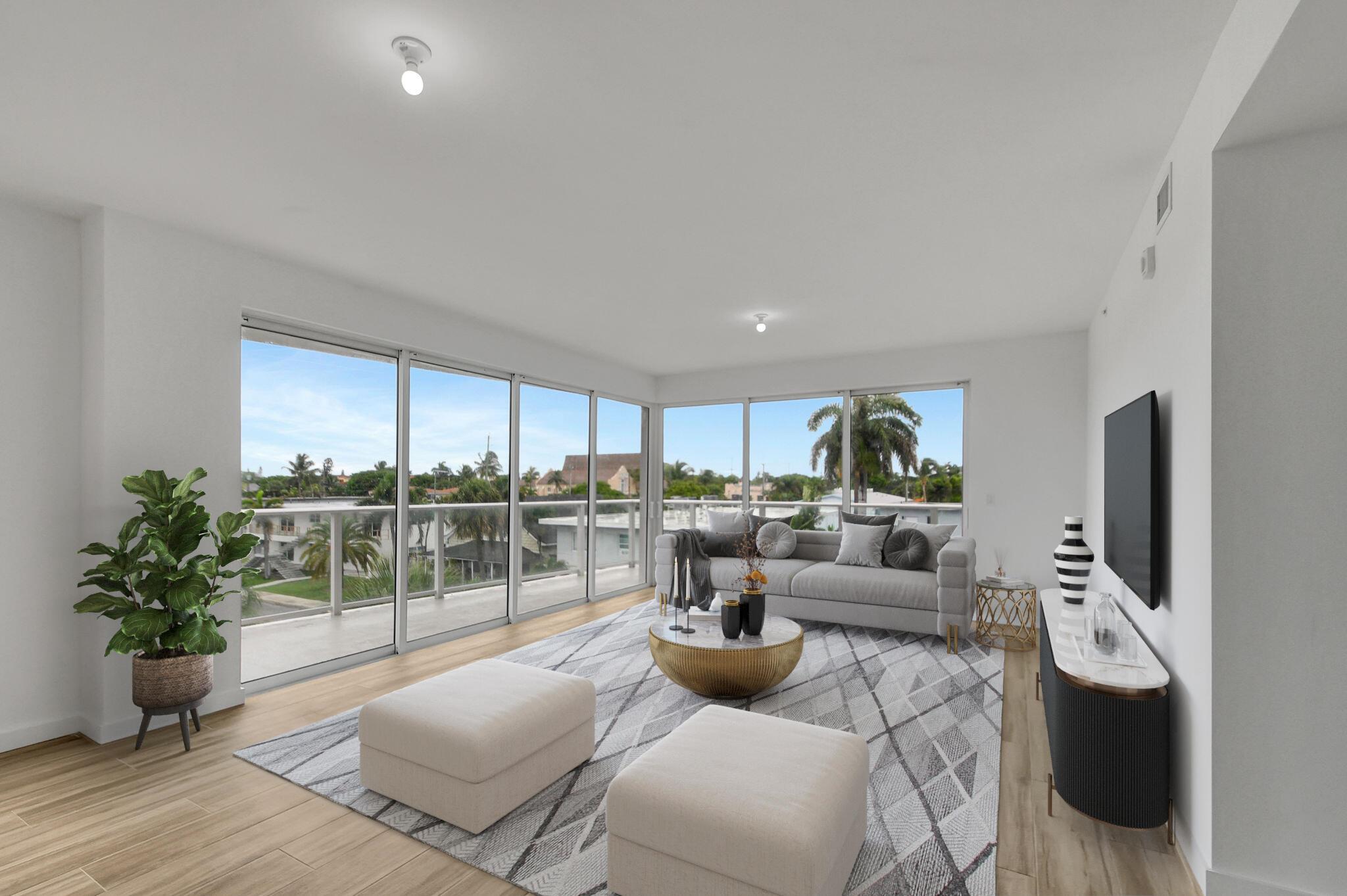 SPECTACULAR SUNSET VIEW! Great location! Built in 2023, Fabulous never lived in 3 bed 2 bath condo less than a mile from the beach. Coastal living at its best! With just 12 units, the boutique ALORA building features 9FT ceilings and impact windows filling the unit with natural light. Italian style kitchen with Bosch appliances, an expansive outdoor wrap around terrace, great for entertaining or unwinding. With a full size Washer and Dryer. Amenities included a rooftop swimming pool, and lounge area where you can relax and enjoy the view of the intracoastal or sunset. Just blocks to restaurants, shopping parks and entertainment. Gated garage parking and entry card system. Virtual staging added for perspective. Don't miss this opportunity.