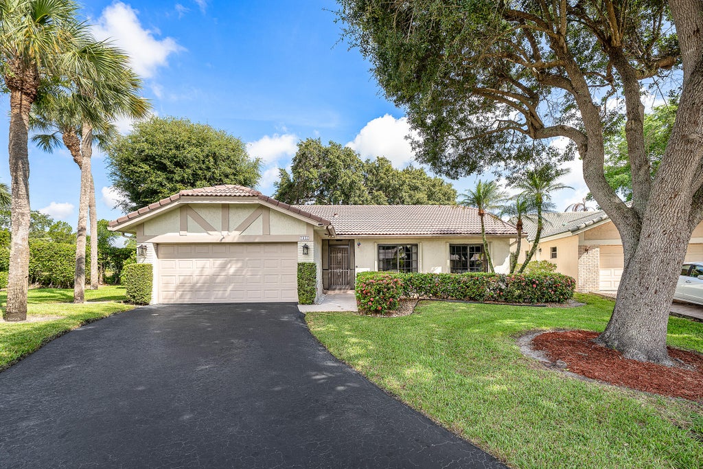 Photo of 7852 Cloverfield Circle, Boca Raton, FL 33433 (MLS # B26042989)