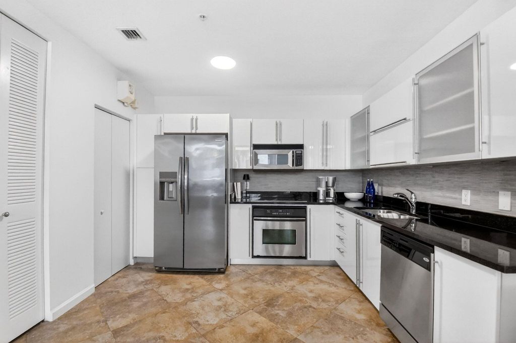 Photo of 1617 N Flagler Drive, West Palm Beach, FL 33407 (MLS # B26024824)