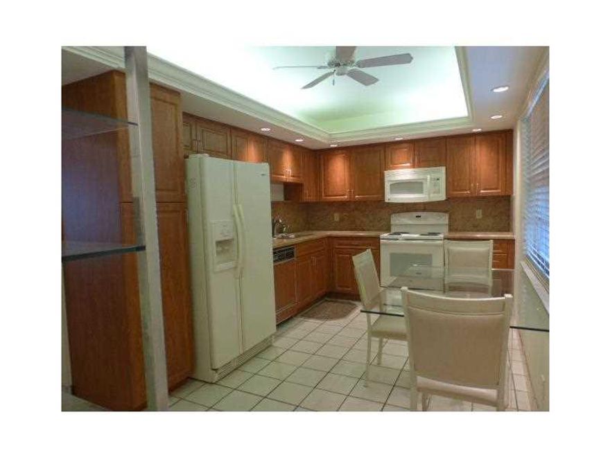 HIGHLY UPGRADED KITCHEN & BATHROOMS. ENCLOSED PATIO W/MAGNIFICENT GOLF VIEWS, MIRRORS, BUILT INS. TILE THRU OUT. GRANITE COUNTER TOPS.  CLOSE TO SHOPPING, RESTAURANTS & THE ISLE CASINO. BEACH IS APPROX 10 MINUTES AWAY. MAINTENANCE INCLUDES BASIC CABLE + H BO 1 AND 2.