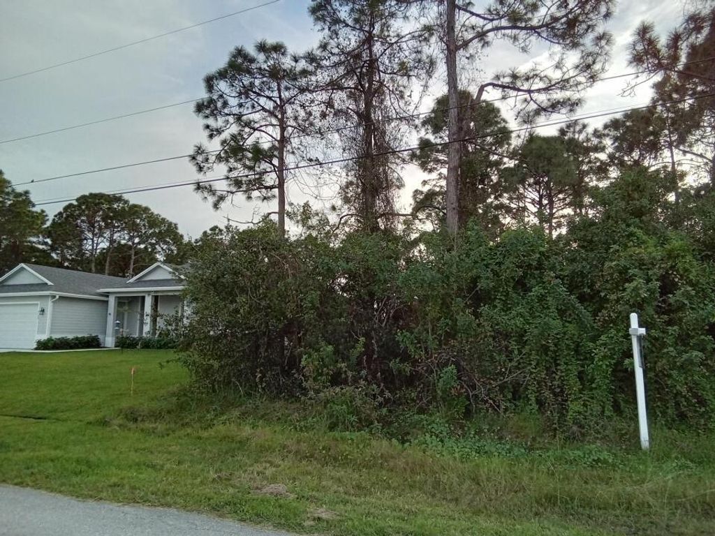 Photo of 6120 NW Densaw Terrace, Port Saint Lucie, FL 34986 (MLS # R10867036)