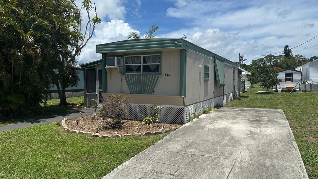 Photo of 5400 SE Jack Avenue #K-18, Stuart, FL 34997 (MLS # R10998438)