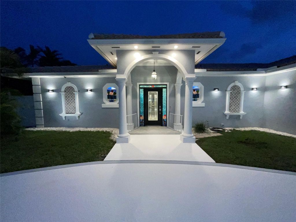 Photo of 1061 Bimini Lane, Riviera Beach, FL 33404 (MLS # F10447515)