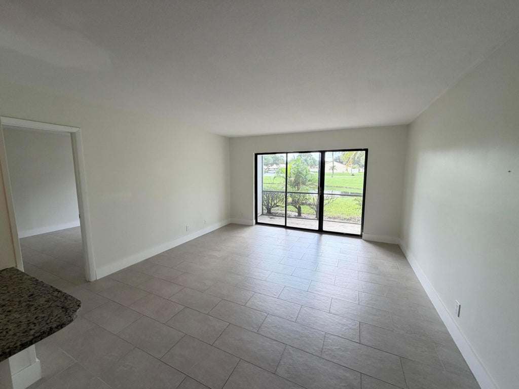 Photo of 1112 GREEN PINE Boulevard #F1, West Palm Beach, FL 33409 (MLS # B26084802)