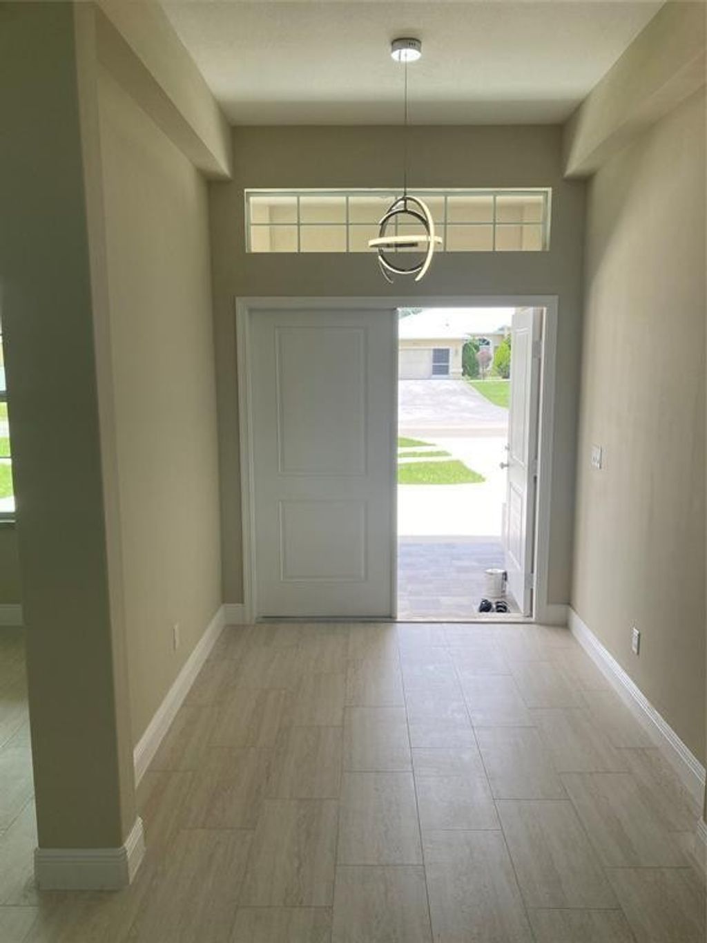 Photo of 1857 SW Certosa Road, Port Saint Lucie, FL 34953 (MLS # F10543409)