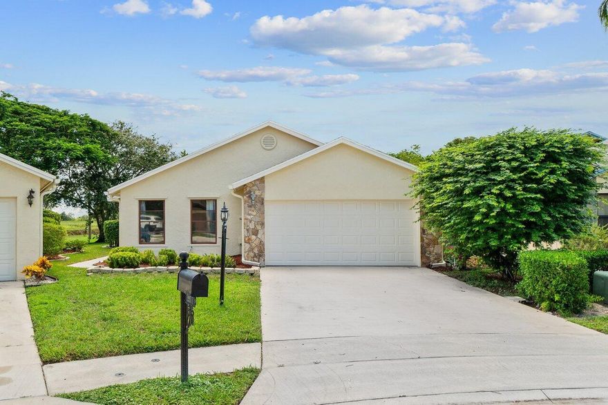 Are you looking for a remodeled home in the heart of Boca? You've found it! Light and bright with partial impact windows and doors! Wood plank tile floors throughout - no carpet. Remodeled bathrooms and remodeled kitchen with white Shaker cabinets, Quartz counter tops, mosaic glass backsplash, large pantry cabinet and updated appliances. Front loader washer and dryer included. Large, screened patio and oversized lake lot! Community has 2 pools, tennis & basketball for your enjoyment! Walk to houses of worship nearby! Lawn Care & Cable w/ HBO are included!