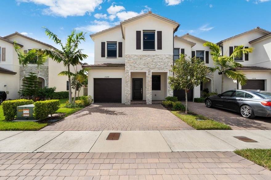 Beautiful 2022 newer construction home on a desirable corner lot. This spacious 4-bedroom, 2.5-bath residence offers a bright open layout, modern kitchen, and comfortable living spaces perfect for entertaining. Enjoy extra privacy and outdoor space.  Conveniently located near the Florida Turnpike, top-rated schools, shopping, dining, and parks. With low HOA and move-in ready condition, this home is perfect for families or buyers seeking modern living in a prime location.