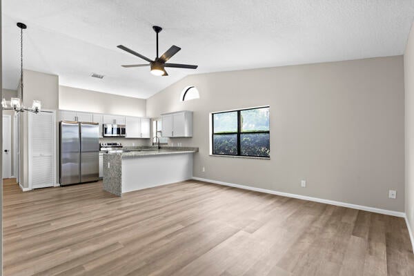 Photo of 147 Parkwood Drive, Royal Palm Beach, FL 33411 (MLS # R10991040)