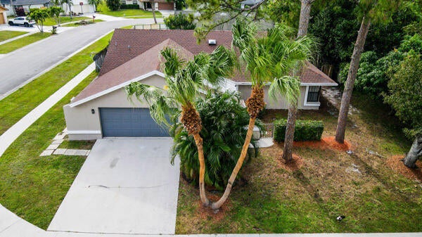 Photo of 147 Parkwood Drive, Royal Palm Beach, FL 33411 (MLS # R10991040)