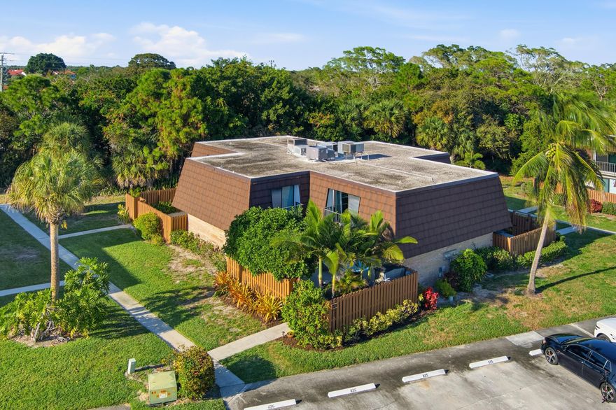 Pristine move-in ready! This 2BR/2.5BA townhome in Stuart's River Pines offers total peace of mind with a new A/C, new water heater, insurable electrical panel, and a paid-in-full mansard assessment. Newly resealed flat roof 2024 (5 yr no leak Guarantee). The interior features a remodeled kitchen with newer appliances and backsplash, beautifully updated bathrooms, fresh paint, and new carpet. Relax in your exceptionally private courtyard with palm trees and a fountain, or enjoy the freshly painted patio and balcony. River Pines is an active, all-ages community featuring two heated pools, pickleball, tennis, and a kayak launch/storage on the Intracoastal. Low HOA fees include cable, lawn care, and exterior insurance. Located near I-95, shopping, and the water. (No rentals first 3 year