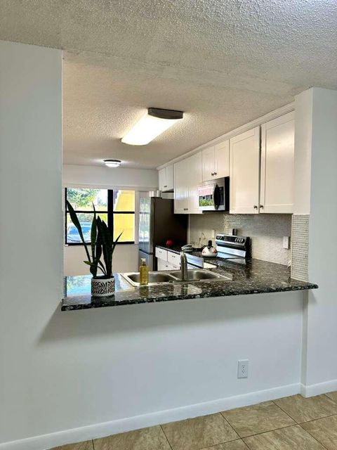 Tiny photo for 4691 Lucerne Lakes Boulevard E #104, Lake Worth, FL 33467 (MLS # R11151687)
