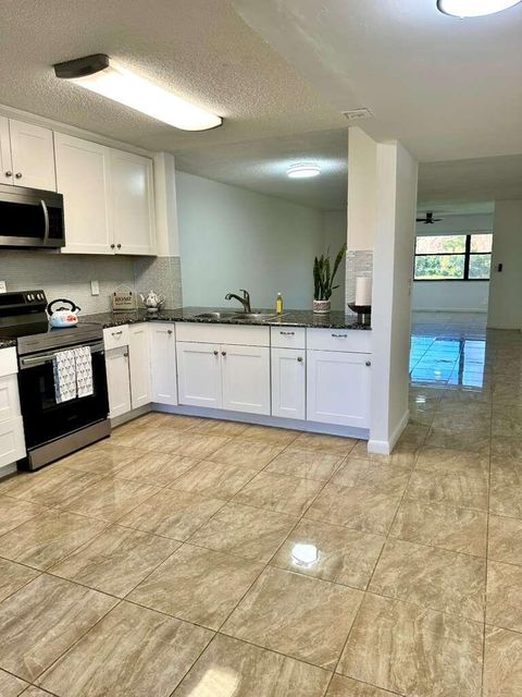 Tiny photo for 4691 Lucerne Lakes Boulevard E #104, Lake Worth, FL 33467 (MLS # R11151687)