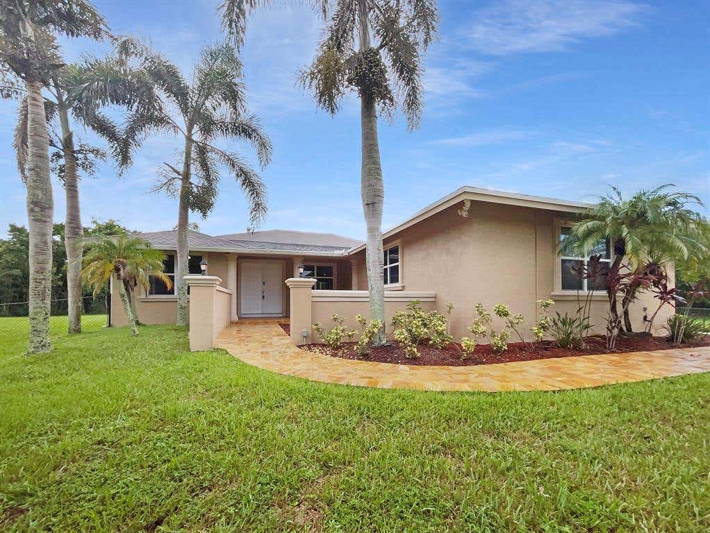 Photo of 7436 167th Court N, West Palm Beach, FL 33418 (MLS # R10834214)