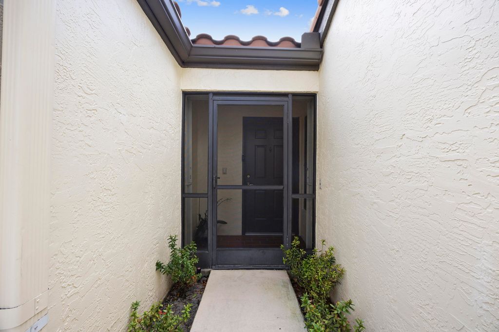 Photo of 5916 Sunswept #A, Boynton Beach, FL 33437 (MLS # B26000790)
