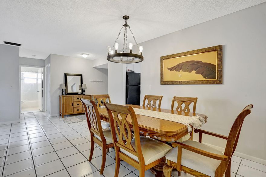 PRICED TO SELL at $274,900, this 3-bedroom condo in Applewood Village 2 in The Township offers incredible value, featuring a 4th bonus room and access to resort-style amenities. This unit features wood and tile flooring, hurricane shutters, and a Florida room with an A/C vent that can also serve as a versatile 4th bonus room for extra living space. Updates:2023 A/C and 2018 water heater. Washer & Dryer included! HOA dues cover water, cable, internet, exterior building insurance, roof maintenance, trash, and sewer. Residents enjoy top-tier amenities, including a theatre, aquatic center, fitness room, tennis and pickleball courts, and a basketball court. Easy access to Florida’s Turnpike, I-95, and Sawgrass Expressway.