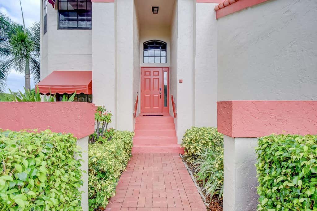 Photo of 7657 LEXINGTON CLUB Boulevard #C, Delray Beach, FL 33446 (MLS # B26060091)