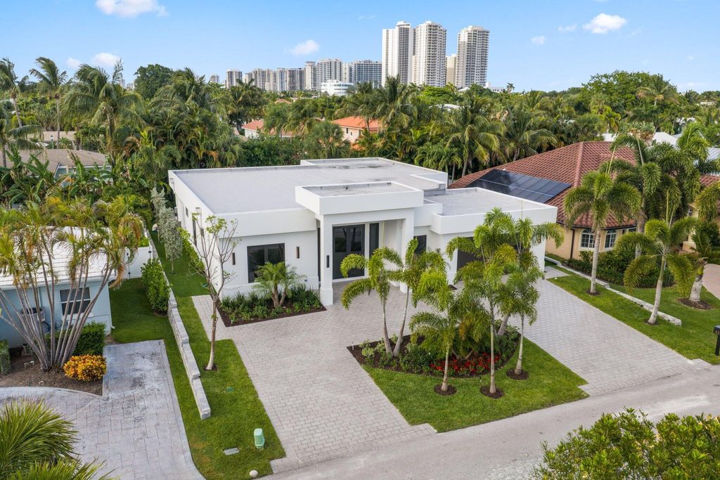 Photo of 325 Cascade Lane, Palm Beach Shores, FL 33404 (MLS # B26025479)