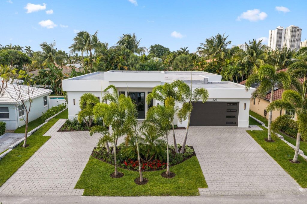 Photo of 325 Cascade Lane, Palm Beach Shores, FL 33404 (MLS # B26025479)