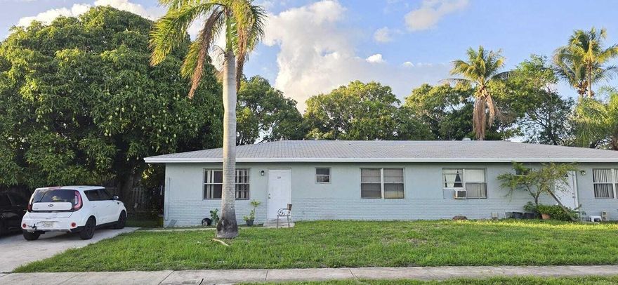 No HOA, strong income-generating duplex opportunity near downtown Boynton Beach, featuring two well-designed 2-bedroom, 2-bath units. Each unit includes its own private driveway and washer/dryer hookup, ideal for tenant comfort and retention. Offering a 6.64% cap rate, this property delivers solid returns in a high-demand rental market. Ideally located just minutes from the beach, Downtown Boynton Beach, and major corridors like Interstate 95, providing easy access to shopping, dining, and employment centers. A turnkey investment with immediate cash flow potential.