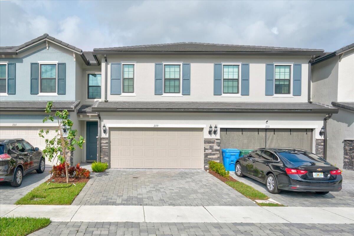 ATTENTION Mortgage Buyers! Qualifying individuals may be able to receive up to $6500.00 in down payment assistance and depending on the offer, Seller may offer concessions towards a rate buy down with the preferred lender.Resort style living without the resort style fees! Pulte has spared no expense in one of their newest communities, Oak Tree. Located in Oakland Park, this modern townhome is generously sized for a family and was built with the highest level of upgrades that include, 9 foot ceilings for added volume, upgraded laundry room with sink conveniently located on the second floor, quartz tile with rounded corners throughout the kitchen, oversized ceramic tile flooring, impact windows, new roof and much more. *some images have been virtually staged.