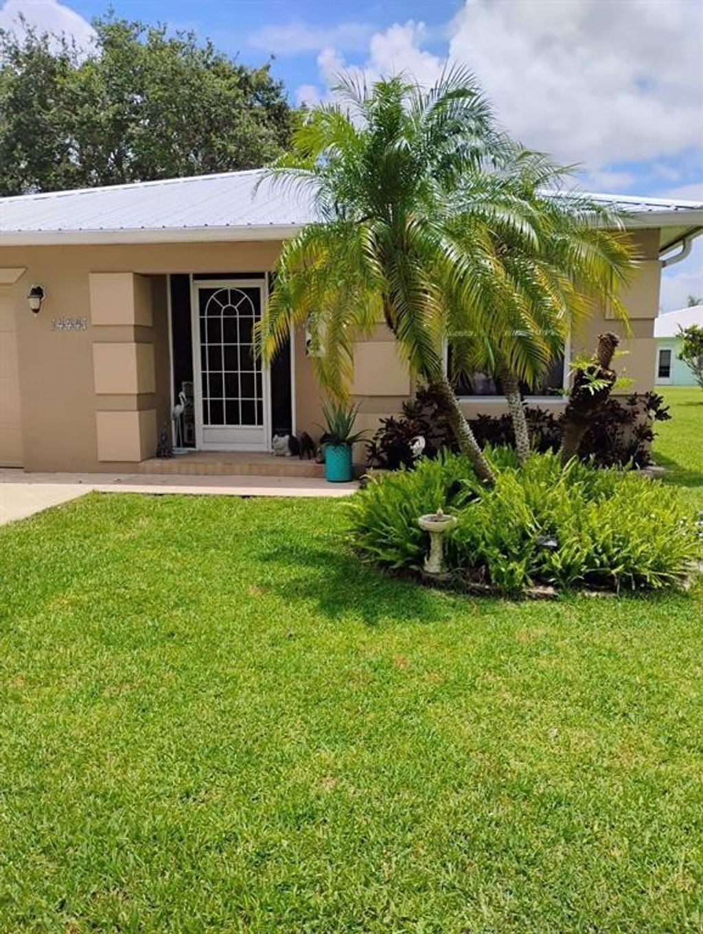 Photo of 14441 Dulce Real Real, Fort Pierce, FL 34951 (MLS # F10536867)