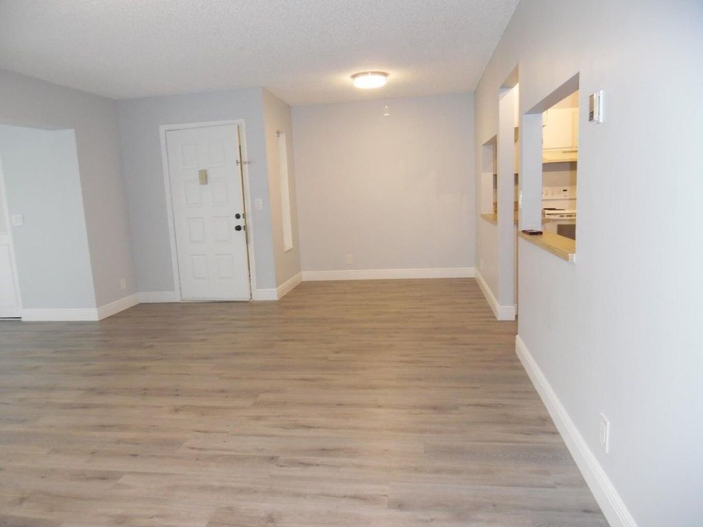 Photo of 502 Shady Pine Way #D2, Greenacres, FL 33415 (MLS # B26030988)